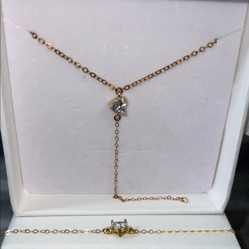 Elegant Gold Necklace with Crystal Pendant